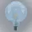 Žiarovka FL G125 4W/470LM E27 230V 2700K CLEAR