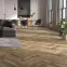 Laminátová podlaha vodeodolná Dub Manor 8mm AC5 Herringbone WR 64833,5